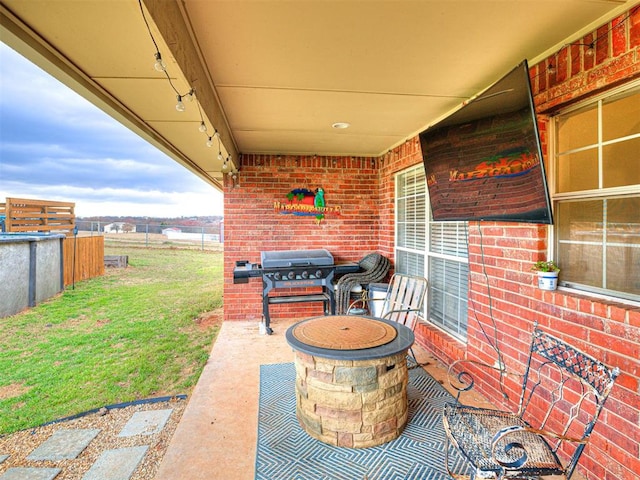 view of patio / terrace featuring fence and area for grilling