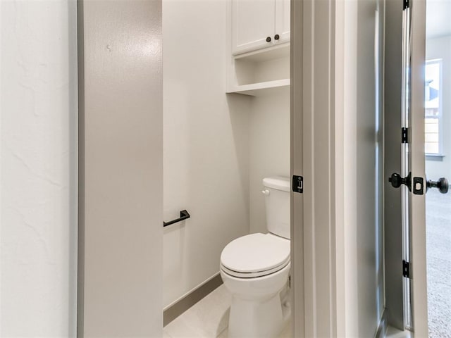 bathroom featuring toilet