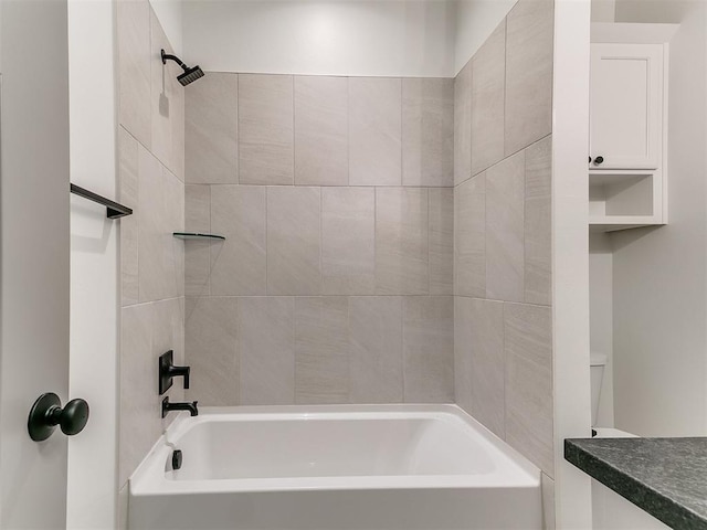 bathroom with shower / bath combination