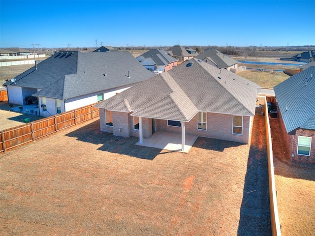 drone / aerial view with a residential view