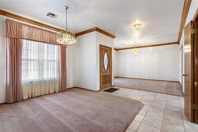 foyer featuring crown molding, light tile patterned floors, light colored carpet, visible vents, and a chandelier