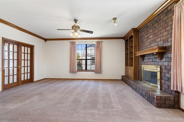 unfurnished living room with carpet floors, a brick fireplace, and crown molding