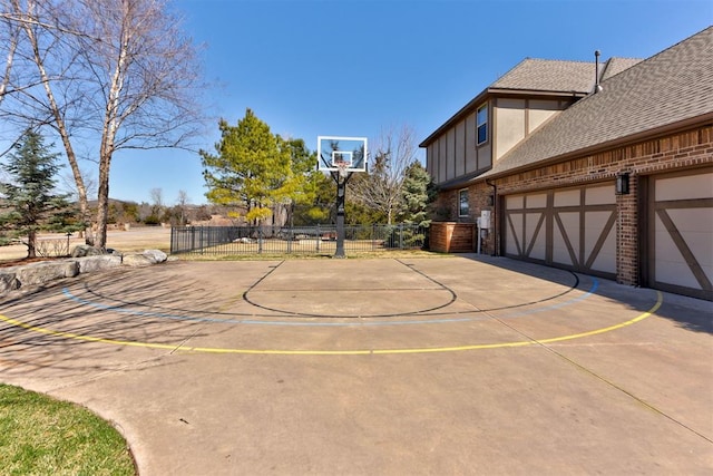 view of sport court featuring community basketball court and fence