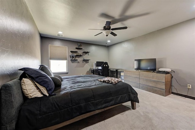 bedroom featuring a ceiling fan, carpet, and visible vents