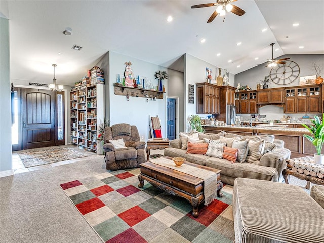 344750 E 830th Rd, Chandler, OK 74834 - living room with a ceiling fan, light carpet, vaulted ceiling, a chandelier, and recessed lighting
