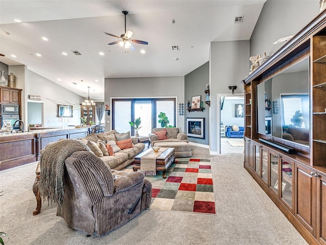 344750 E 830th Rd, Chandler, OK 74834 - living area featuring light carpet, a chandelier, a ceiling fan, recessed lighting, and baseboards
