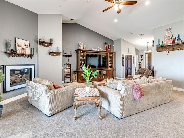 344750 E 830th Rd, Chandler, OK 74834 - carpeted living room featuring a ceiling fan, vaulted ceiling, baseboards, a glass covered fireplace, and recessed lighting
