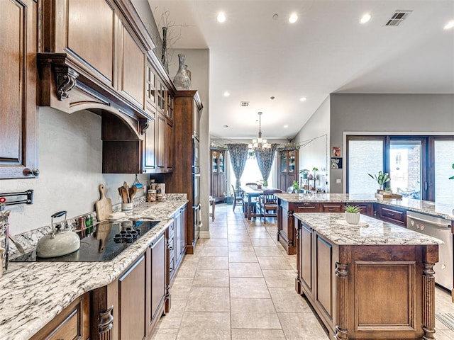 344750 E 830th Rd, Chandler, OK 74834 - kitchen featuring appliances with stainless steel finishes, a chandelier, a spacious island, recessed lighting, and light stone countertops