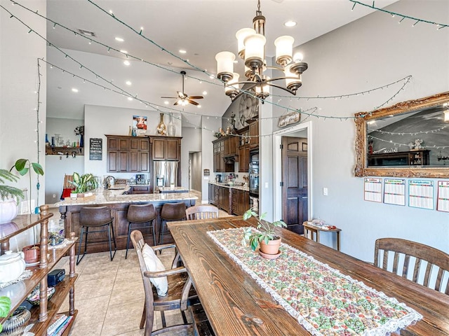 344750 E 830th Rd, Chandler, OK 74834 - dining area with ceiling fan, recessed lighting, a chandelier, light tile patterned flooring, and high vaulted ceiling