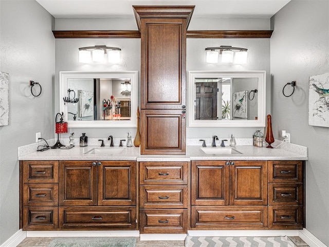 344750 E 830th Rd, Chandler, OK 74834 - full bathroom featuring double vanity and baseboards