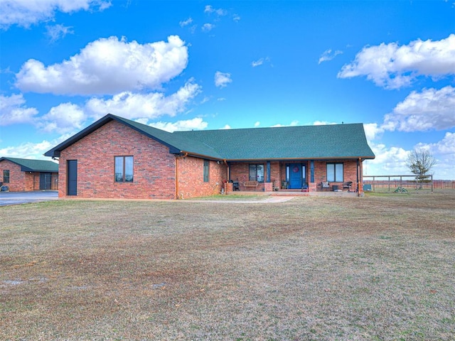344750 E 830th Rd, Chandler, OK 74834 - ranch-style house with brick siding, covered porch, and a shingled roof
