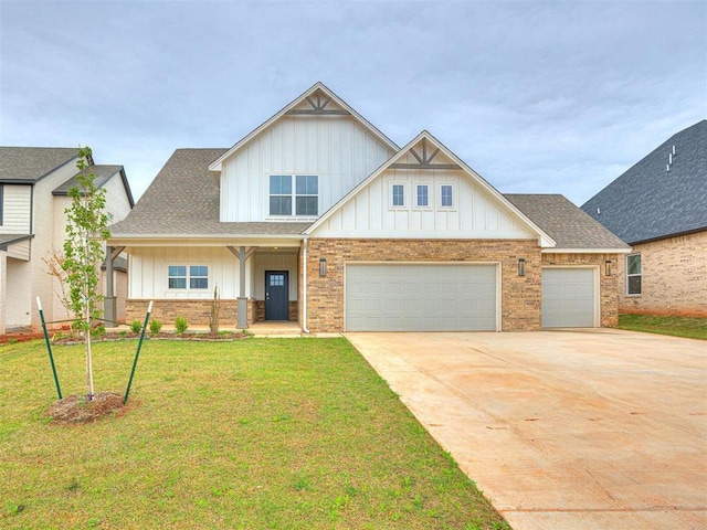 craftsman-style house with an attached garage, brick siding, concrete driveway, board and batten siding, and a front yard