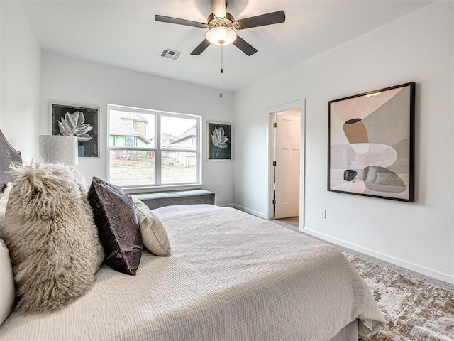 bedroom featuring visible vents, ceiling fan, and baseboards