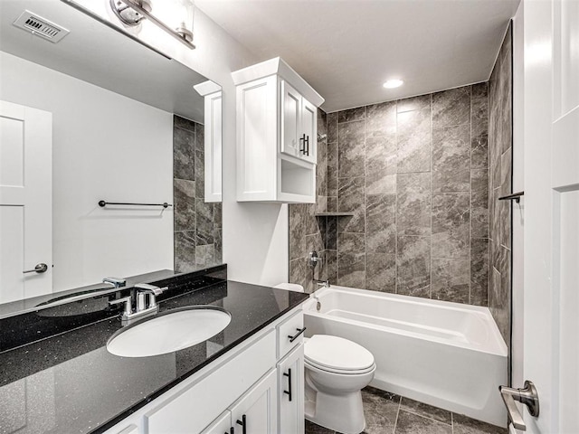 bathroom with recessed lighting, visible vents, toilet, vanity, and  shower combination