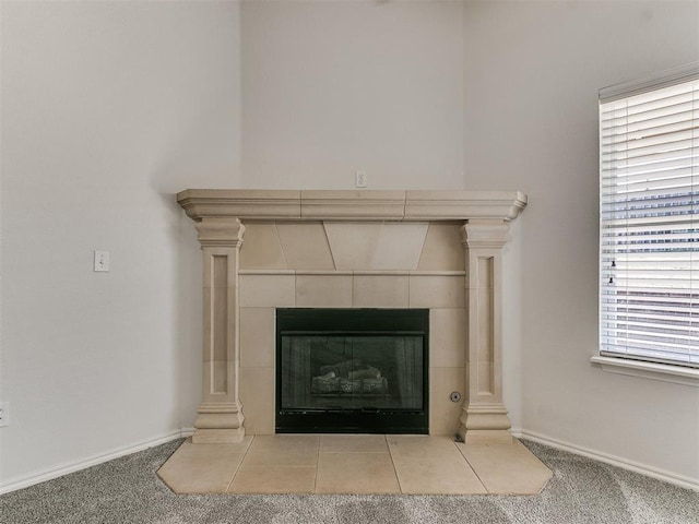 room details with carpet, a fireplace, and baseboards