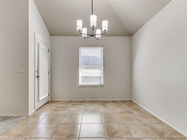 spare room featuring lofted ceiling, light tile patterned floors, baseboards, and a notable chandelier