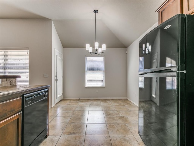 kitchen featuring a notable chandelier, light tile patterned floors, dark countertops, vaulted ceiling, and black appliances