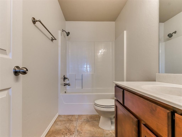 bathroom featuring bathtub / shower combination, vanity, toilet, and baseboards