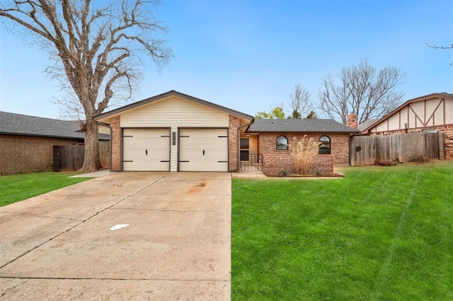 view of front of house featuring concrete driveway, brick siding, a front yard, and fence