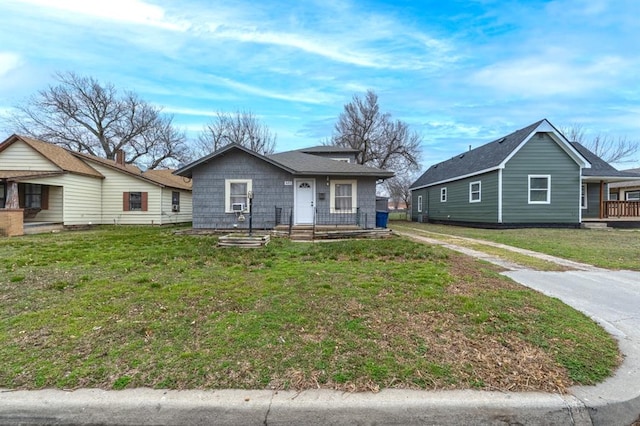 bungalow with a front lawn