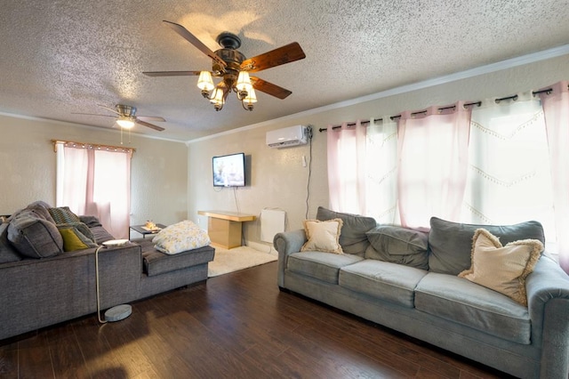 living room with ornamental molding, wood finished floors, a textured ceiling, and a wall mounted AC