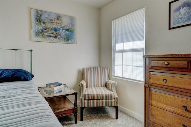 carpeted bedroom with baseboards