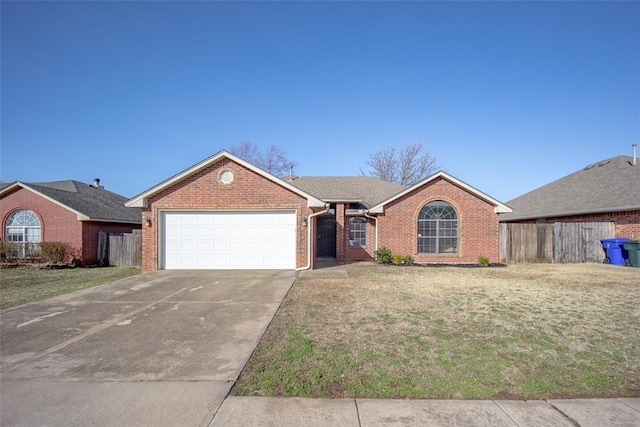 ranch-style house featuring a garage, concrete driveway, fence, a front lawn, and brick siding