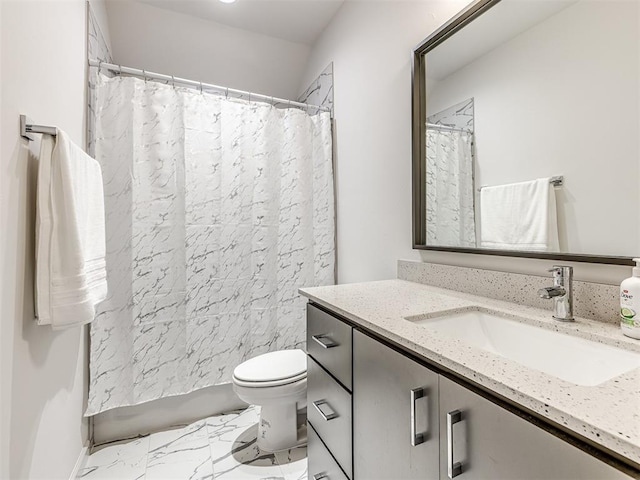 bathroom with toilet, marble finish floor, curtained shower, and vanity