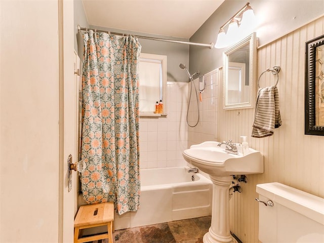 full bathroom with toilet and shower / tub combo with curtain