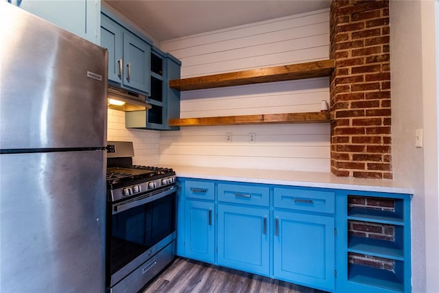 kitchen with blue cabinets, under cabinet range hood, appliances with stainless steel finishes, and open shelves