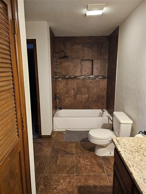 full bathroom featuring toilet, shower / bathing tub combination, a textured wall, a textured ceiling, and vanity