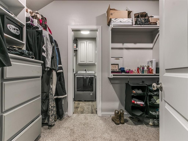 spacious closet featuring carpet and washer / clothes dryer