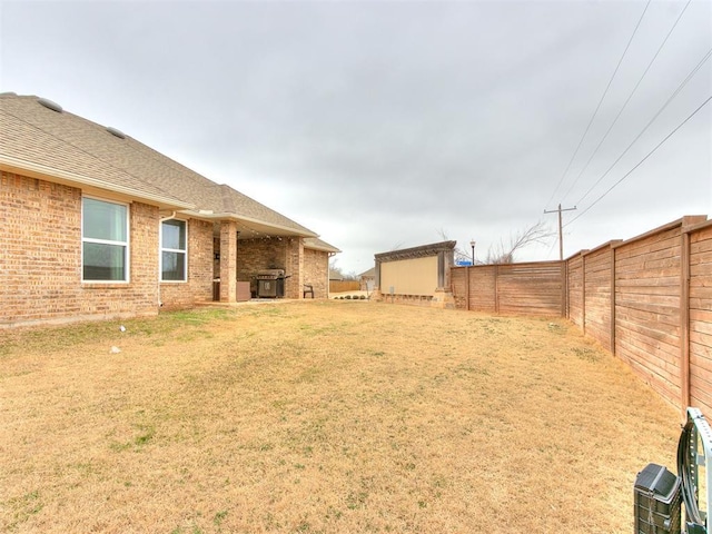 view of yard featuring a fenced backyard