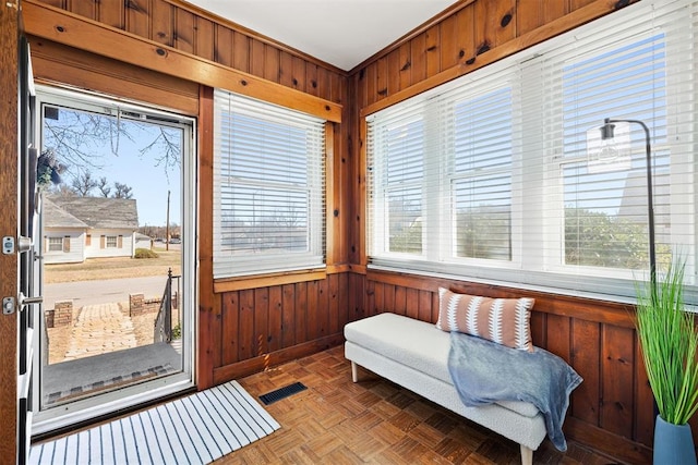 sunroom featuring visible vents