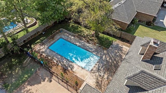 view of pool with a patio area and a fenced backyard