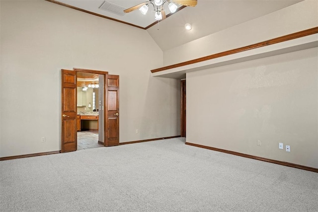 interior space with visible vents, baseboards, light colored carpet, ceiling fan, and high vaulted ceiling