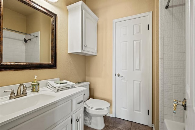 full bath with toilet, tile patterned flooring, shower / bathing tub combination, and vanity