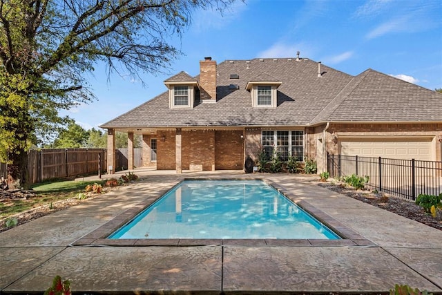 view of pool featuring a fenced in pool, a fenced backyard, and a patio