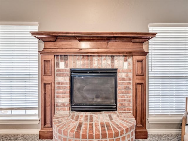 details with a brick fireplace