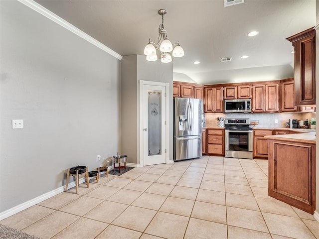 kitchen with light tile patterned floors, stainless steel appliances, light countertops, pendant lighting, and backsplash