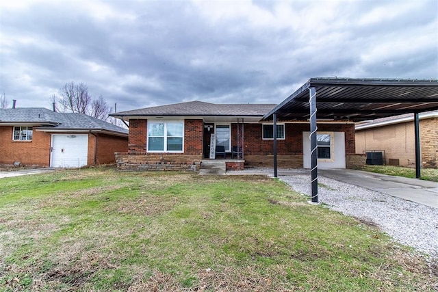 single story home with central air condition unit, brick siding, concrete driveway, and a front yard