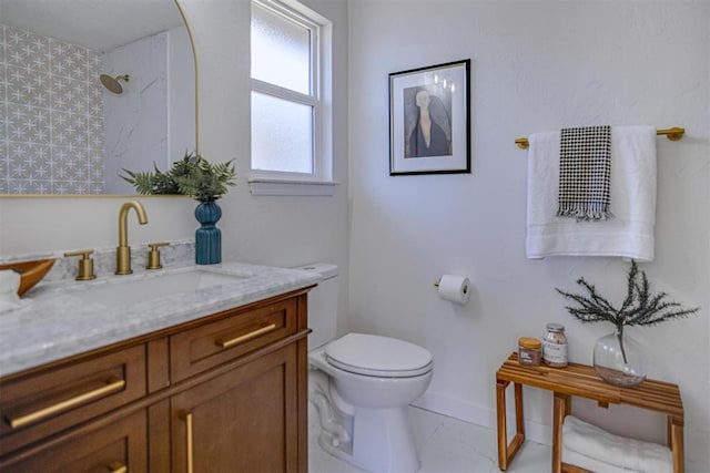 bathroom with a shower, marble finish floor, toilet, and vanity