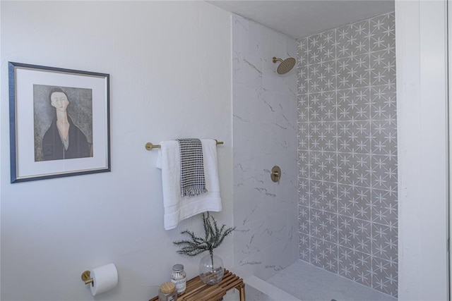 full bathroom with tiled shower