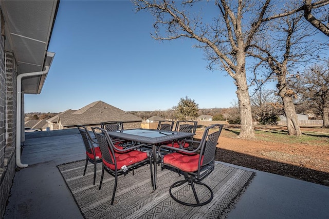 view of patio featuring outdoor dining area