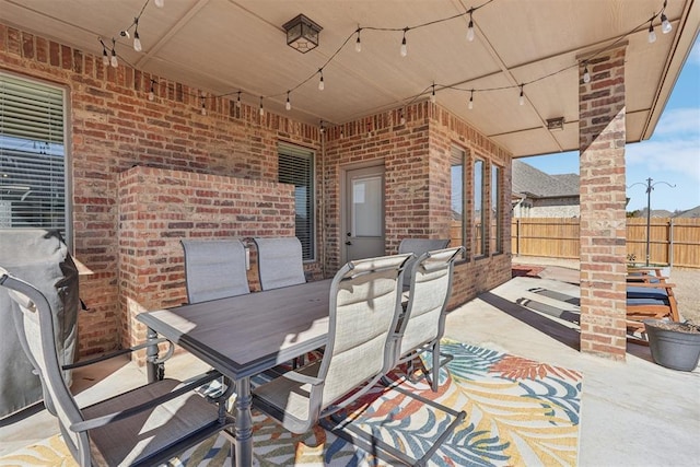 view of patio / terrace with fence and outdoor dining space