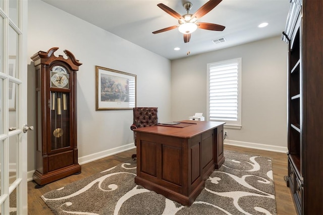 office featuring dark wood-type flooring, recessed lighting, visible vents, and baseboards