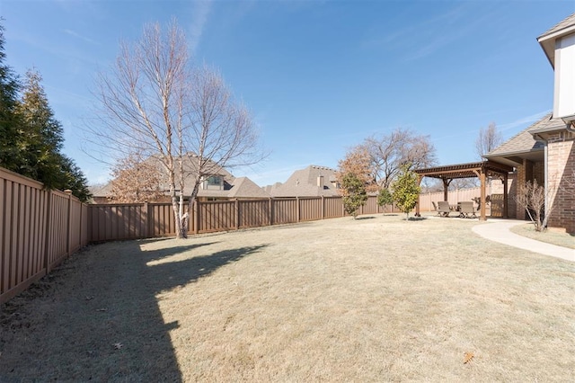 view of yard featuring a fenced backyard and a patio