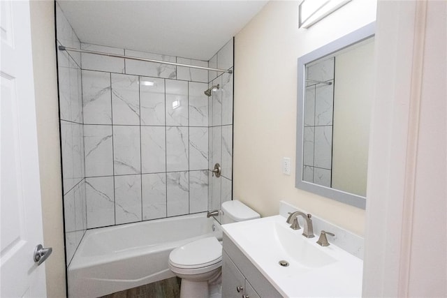 full bathroom featuring bathtub / shower combination, vanity, and toilet