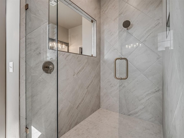 bathroom featuring a stall shower