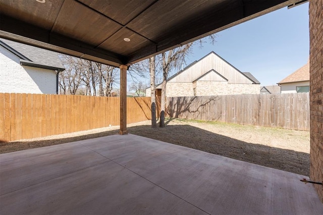 view of patio featuring a fenced backyard